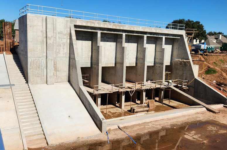 A picture containing pump station structure